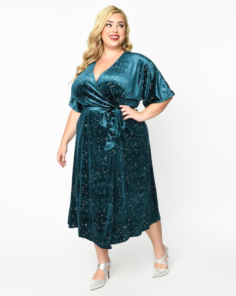 Front of a model wearing a size 3X Unique Vintage Teal Velvet & Silver Stars Wrap Midi Dress in Teal Velvet & Silver Stars by Unique Vintage. | dia_product_style_image_id:319971